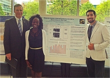 President Peterson with School of Biology seniors Marteki Codjoe and Nima Yazdanpanah